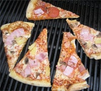 Reheating pizza on a BBQ